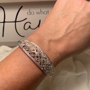 Silver hinged bangle bracelet filigree hearts clear rhinestones rhodium plated?
